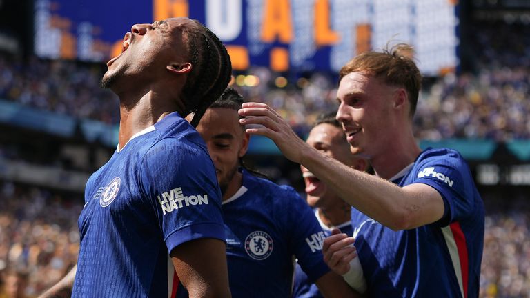 Chelsea's Joao Pedro, left, celebrates with teammates after scoring against PSG