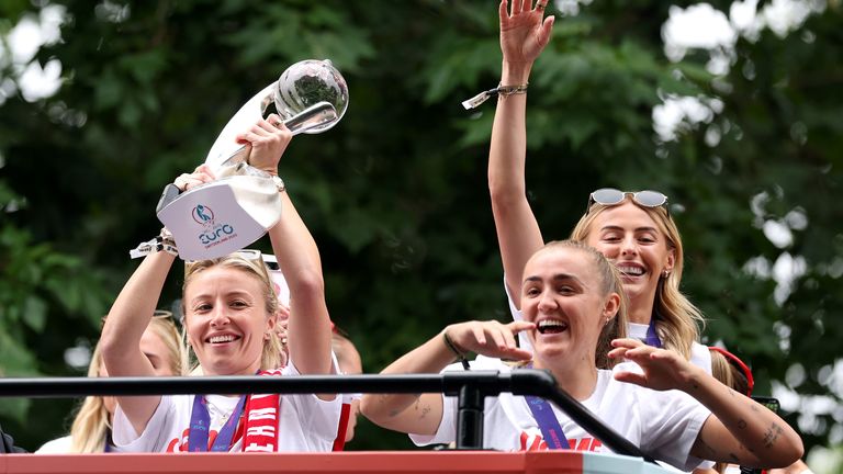 Leah Williamson holds the UEFA Women's Euro trophy during the England Women's team victory parade and celebration