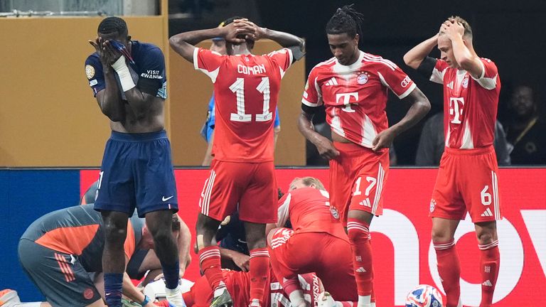 Bayern Munich's Jamal Musiala lies on the ground during the Club World Cup quarterfinal soccer match between PSG and Bayern Munich in Atlanta, Saturday, July 5, 2025. (AP Photo/Mike Stewart)