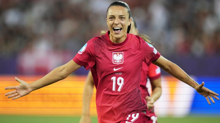 Poland's Natalia Padilla celebrates after scoring her side's opening goal against Denmark