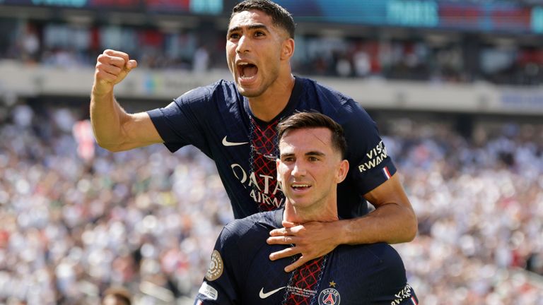 Fabian Ruiz (bottom) and Achraf Hakimi celebrate the former's goal for PSG against Real Madrid at the Club World Cup