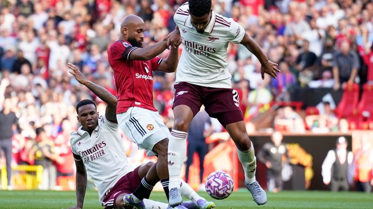 Arsenal's Gabriel and William Saliba challenge Manchester United's Bryan Mbeumo (AP Photo/Dave Thompson)