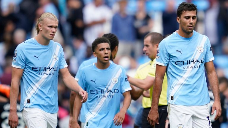 Manchester City's Erling Haaland, Rico Lewis and Rodri after defeat to Tottenham