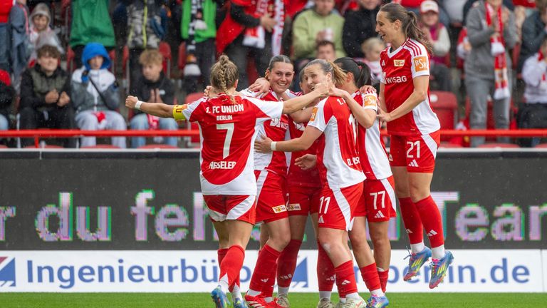 Players from 1. FC Union Berlin cheer after the Union goal for 1:0 against FSV Gutersloh