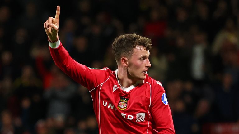 Nathan Broadhead celebrates scoring for Wrexham