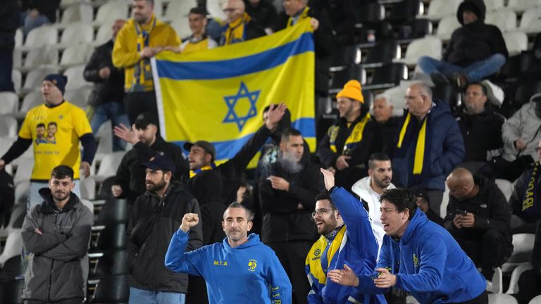 Maccabi Tel Aviv fans cheer on their side in a Europa League tie with Porto