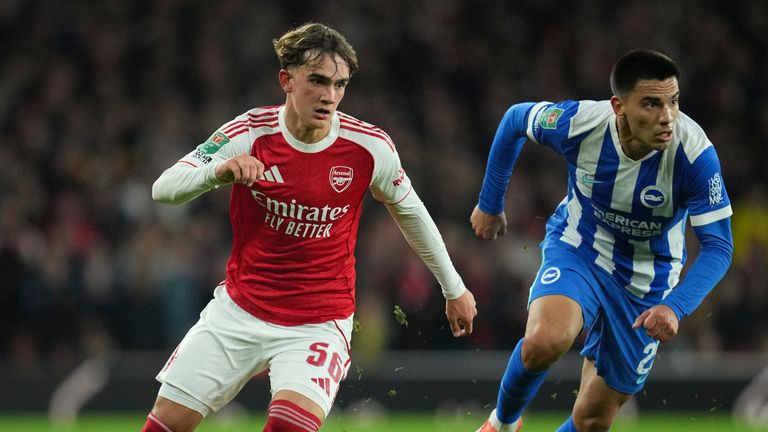 Arsenal's Max Dowman, left, is in action during the English League Cup soccer match between Arsenal and Brighton & Hove Albion in London, Wednesday, Oct. 29, 2025. (AP Photo/Kin Cheung)