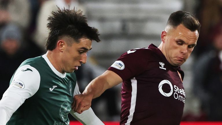 EDINBURGH, SCOTLAND - OCTOBER 04: Hearts Lawrence Shankland and Hibs Kieron Bowie in action during a William Hill Premiership match between Heart of Midlothian and Hibernian at Tynecastle Park, on October 04, 2025, in Edinburgh, Scotland. (Photo by Craig Williamson / SNS Group)