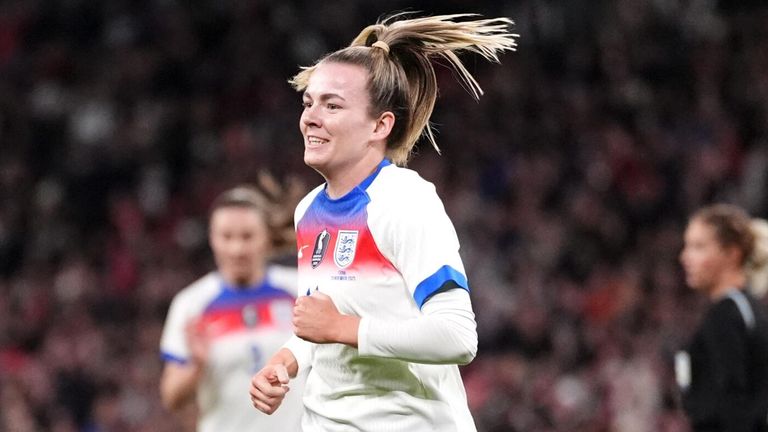 Lauren Hemp celebrates after scoring England's third goal against China