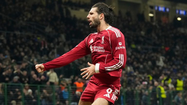 Liverpool's Dominik Szoboszlai celebrates after scoring  from the penalty spot against Inter Milan