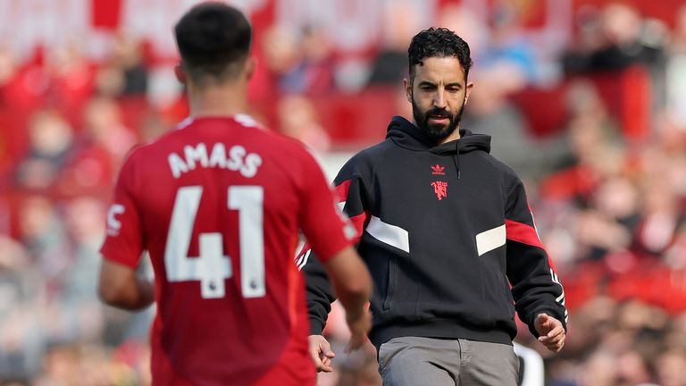 Ruben Amorim retrieves the ball for Harry Amass