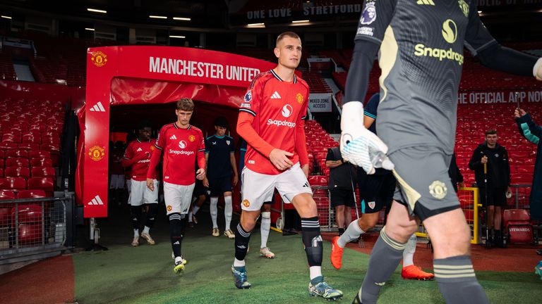 Rhys Bennett of Manchester United walks out prior to the Premier League International Cup match between Man Utd U21 & Athletic Club