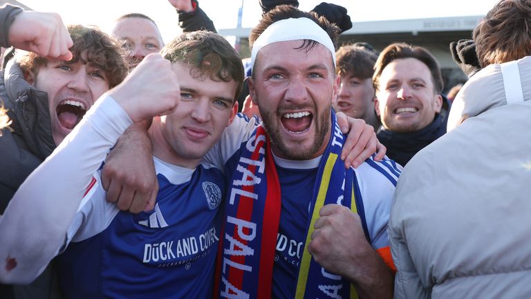 Goalscorer Paul Dawson celebrates with supporters following Macclesfield's shock 2-1 win against Crystal Palace