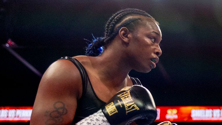 Claressa Shields, left, fights with Danielle Perkins during the undisputed heavyweight title match on Sunday, Feb. 2, 2025 at Dort Financial Center in Flint. (Jake May/The Flint Journal via AP)