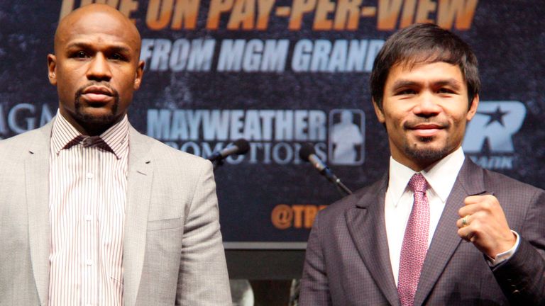 Floyd Mayweather and Manny Pacquiao in 2015 announcing their first fight (Kyodo via AP Images)