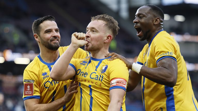 Mansfield Town's Louis Reed celebrates scoring their side's second goal of the game