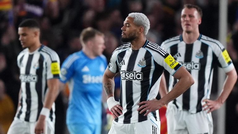 Joelinton and his Newcastle team-mates look dejected after conceding for the sixth time at Camp Nou