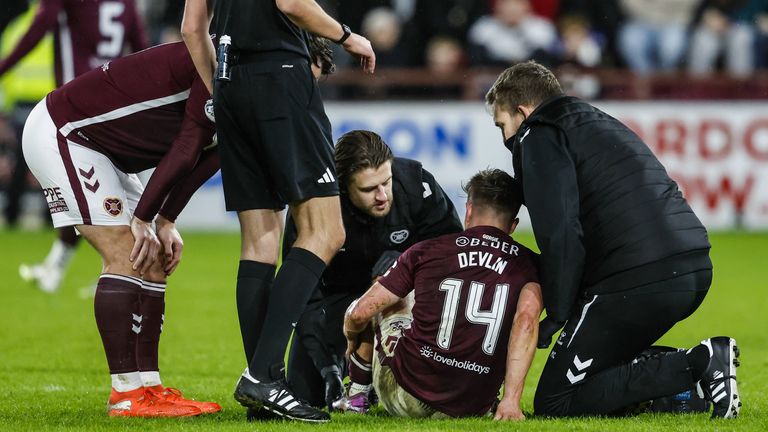 EDINBURGH, SCOTLAND - JANUARY 14: Hearts' Cammy Devlin recieves treatment for an injury during a William Hill Premiership match between Heart of Midlothian and St Mirren at Tynecastle Park, on January 14, 2026, in Edinburgh, Scotland. (Photo by Mark Scates / SNS Group)