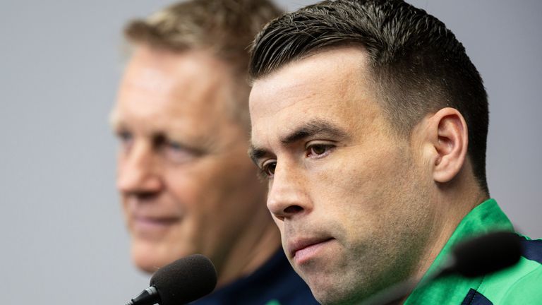 Heimir Hallgrimsson, head coach of Ireland, and defender Seamus Coleman at a press conference 