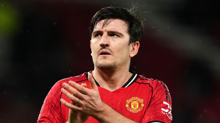 Harry Maguire applauds Old Trafford