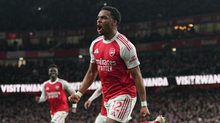 Arsenal's Jurrien Timber celebrates after restoring their lead over Chelsea (AP Photo/Alastair Grant)