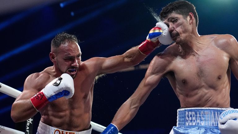 Keith Thurman lands a left to Sebastian Fundora in a super-welterweight bout in March 2026 (Associated Press)