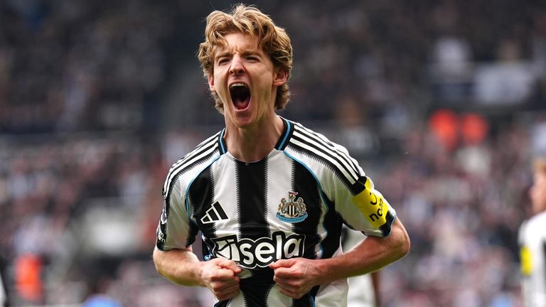 Anthony Gordon celebrates after opening the scoring for Newcastle against Sunderland