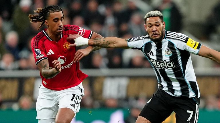 Leny Yoro and Joelinton battle for the ball 