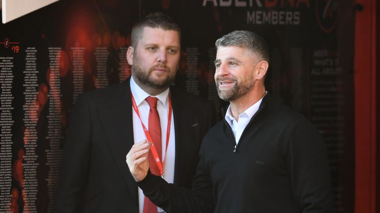 ABERDEEN, SCOTLAND - MAY 24: St Mirren manager Stephen Robinson (R) and Aberdeen's Chief Executive Alan Burrows during a cinch Premiership match between Aberdeen and St Mirren at Pittodrie, on May 24, 2023, in Aberdeen, Scotland.  (Photo by Craig Foy / SNS Group)
