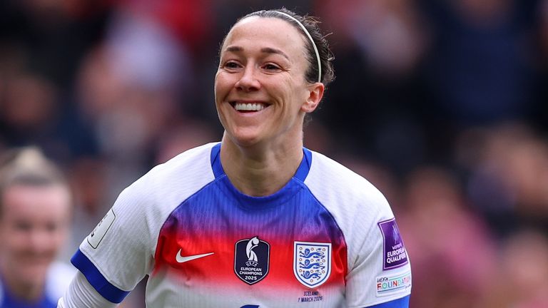 Lucy Bronze celebrates after giving England the lead against Iceland