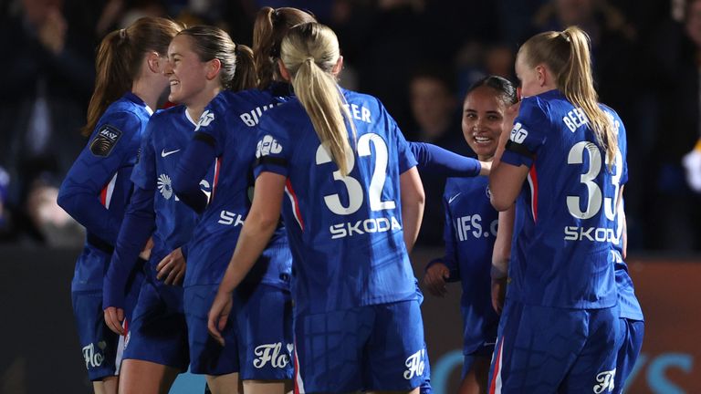 Chelsea players celebrate Alyssa Thompson's opening goal against Brighton