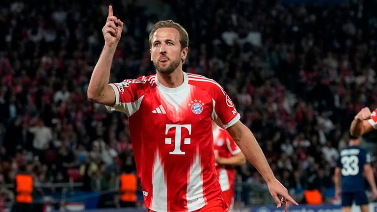 Harry Kane celebrates after keeping his composure from the penalty spot give Bayern an early lead