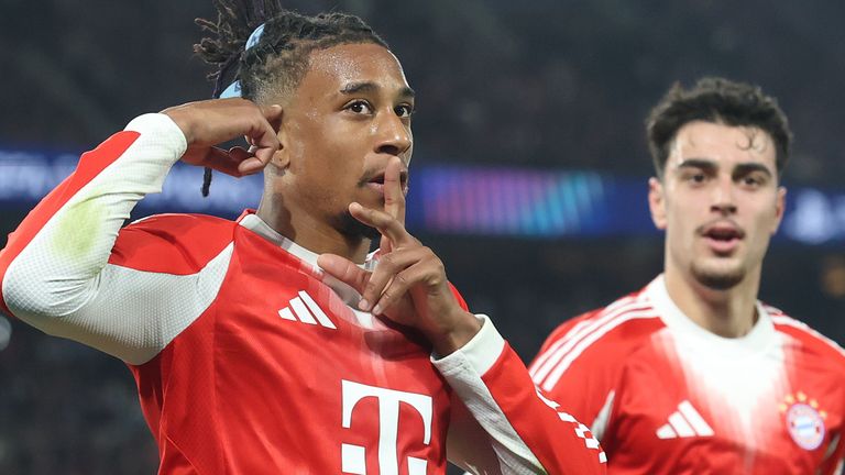 Michael Olise celebrates bringing Bayern Munich level at 2-2 against PSG