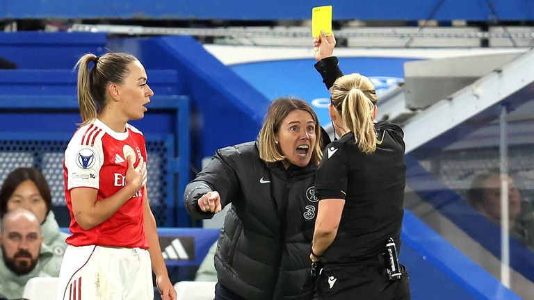 Chelsea manager Sonia Bompastor shouts at referee Frida Mia Klarlund Nielsen, earning a yellow card, which is followed by a second