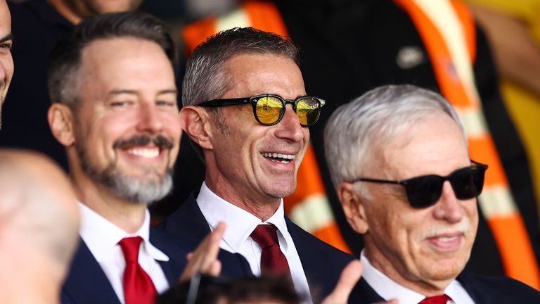 Andrea Berta pictured between Josh and Stan Kroenke at Selhurst Park