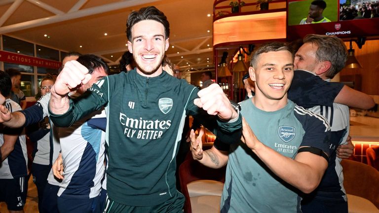 Declan Rice and Leandro Trossard celebrate Arsenal's Premier League title win