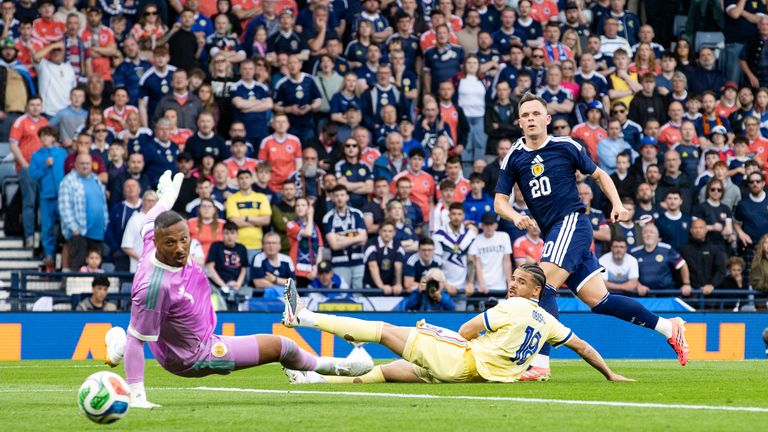 Scotland's Lawrence Shankland scores to make it 3-1 against Curacao