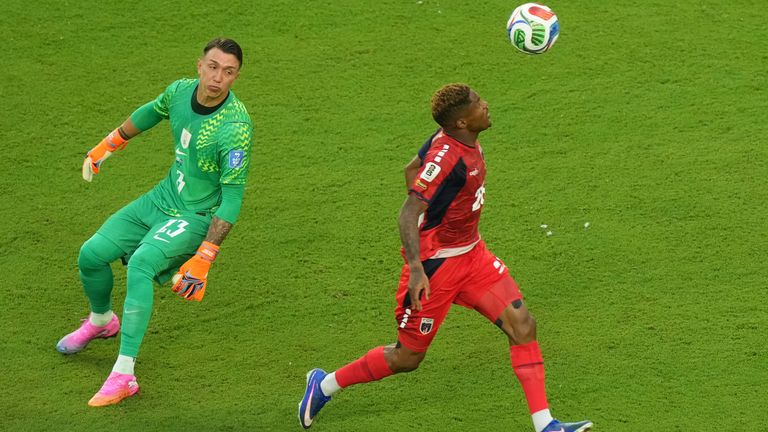 Cape Verde's Helio Varela dribbles past Uruguay goalkeeper Fernando Muslera 