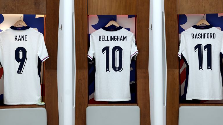 The shirts of Harry Kane, Jude Bellingham and Marcus Rashford are seen inside the England dressing room