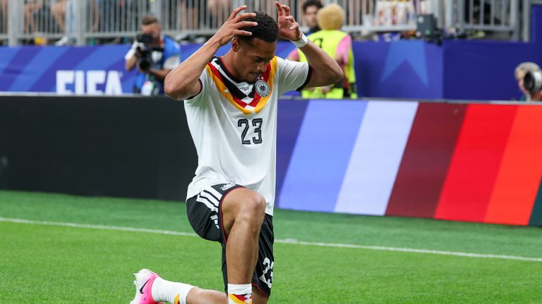 HOUSTON, TX - JUNE 14: Felix Nmecha #23 of Germany celebrates his goal by pretending to take off his crown during the FIFA World Cup 2026 Group E match between Germany and Cura..ao on June 14, 2026, at Houston Stadium in Houston, Texas. (Photo by David Buono/Icon Sportswire) (Icon Sportswire via AP Images)