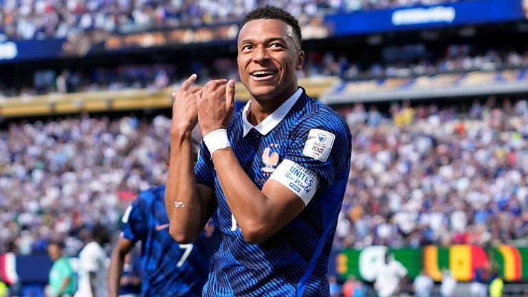 France's Kylian Mbappe celebrates after scoring the opening goal