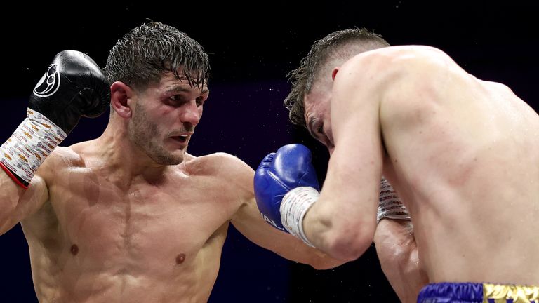 Lee Cutler punches Stephen McKenna during the WBC International Silver Title Super Welterweight fight in 2024