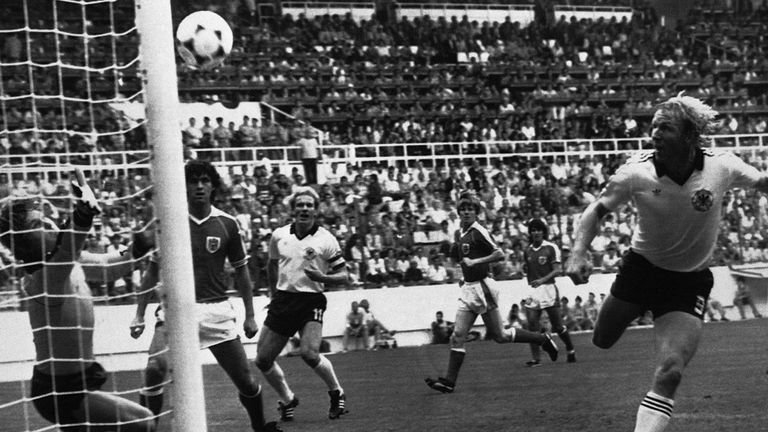 Horst Hrubesch of West Germany heads in during a 1-0 win against Austria at the 1982 World Cup - a result which suited both teams