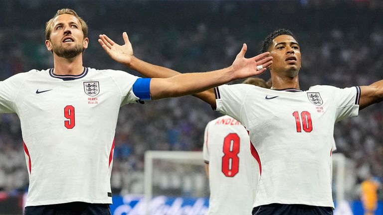 Jude Bellingham celebrates with Harry Kane after opening the scoring against Mexico