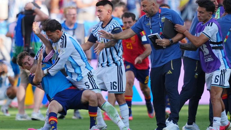 Argentina's Leandro Paredes (5) knocks down Spain's Gavi (9) during scuffle after the World Cup final soccer match between Spain and Argentina in East Rutherford, N.J., near New York, Sunday, July 19, 2026. (AP Photo/Julio Cortez)