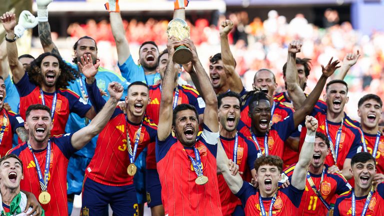 Spain's Rodri lifts the World Cup