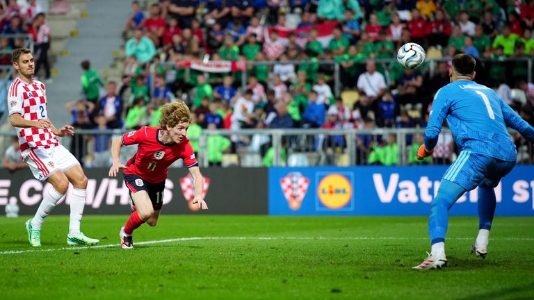 Anthony Gordon heads in England's third goal of a dominant win
