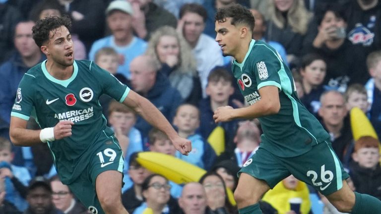 Yasin Ayari celebrates with Charalampos Kostoulas after giving Brighton an early lead at Manchester City