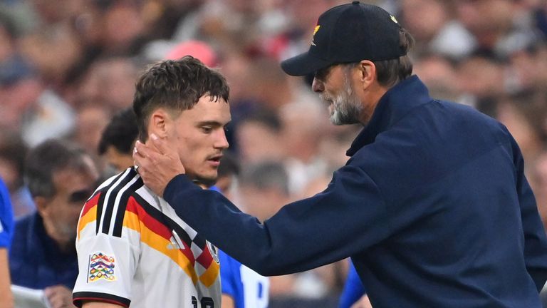 Germany head coach and former Liverpool boss Jurgen Klopp consoles Florian Wirtz during his country's Nations League match against Serbia